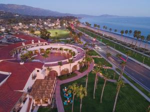 an aerial view of a resort with palm trees and the ocean at Hilton Santa Barbara Beachfront Resort in Santa Barbara