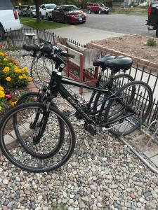 two bikes are parked next to a fence at Downtown B&B with Jacuzzi in Glenwood Springs