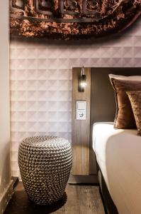 Postel nebo postele na pokoji v ubytování Golden Tulip Leiden Centre