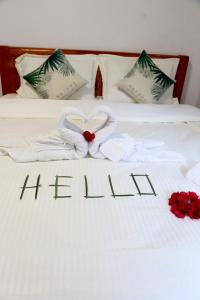 Postel nebo postele na pokoji v ubytování JE T'AIME VILLA - Khu nghỉ dưỡng nhà vườn nằm giữa thiên nhiên bao la hoa cỏ