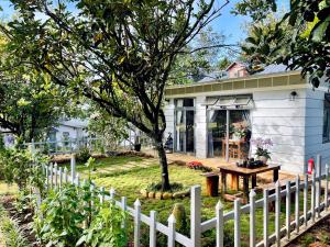 Zahrada ubytování JE T'AIME VILLA - Khu nghỉ dưỡng nhà vườn nằm giữa thiên nhiên bao la hoa cỏ