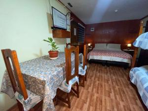 מיטה או מיטות בחדר ב-Cabañas Dichato Turismo Roma