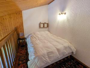 Giường trong phòng chung tại Appartement La Clusaz, 3 pièces, 6 personnes - FR-1-459-211