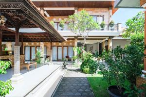 Zahrada ubytování Wayan House Seminyak + 9 fotografií