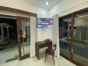 TV o dispositivi per l'intrattenimento presso Namika Villas Ubud