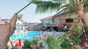 a resort with a pool with a water park at RuysukJo Resort&Pool in Udon Thani