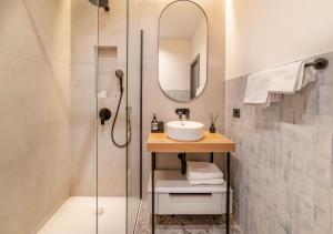 a bathroom with a sink and a mirror at MAROEN 3 Lux Apartment Old Town in Split