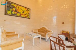 Posezení v ubytování Hoang Minh Chau Ba Trieu Hotel