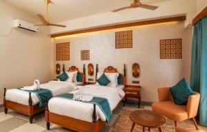 Hotel Sonar Bangla Mayapur客房内的一张或多张床位