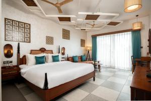 Hotel Sonar Bangla Mayapur客房内的一张或多张床位
