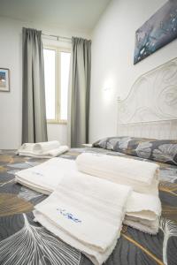 A bed or beds in a room at Il Sogno