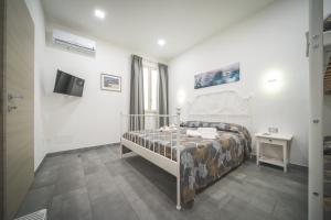 A bed or beds in a room at Il Sogno