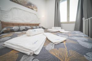 A bed or beds in a room at Il Sogno