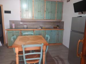 A kitchen or kitchenette at Perla marina