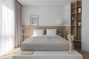 Postel nebo postele na pokoji v ubytování 77 views apartments by INSHI