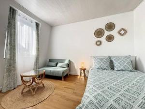 Khu vực ghế ngồi tại Joli et lumineux studio proche Paris