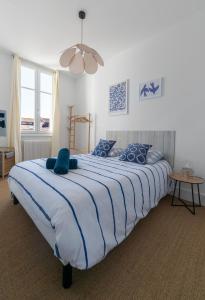 Posteľ alebo postele v izbe v ubytovaní Residence Le Languedoc - Appartements design - Proche des parcs