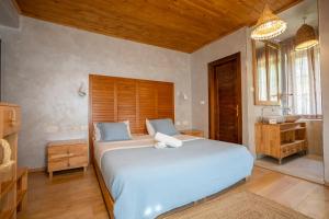 Postel nebo postele na pokoji v ubytování Hotel Restaurant Alpet Theth