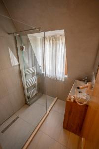 Koupelna v ubytování Hotel Restaurant Alpet Theth