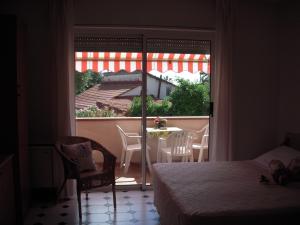 Posteľ alebo postele v izbe v ubytovaní Residence Hotel Edy