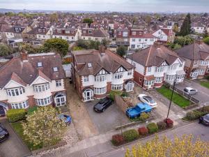 an aerial view of a residential neighbourhood with houses at Willow Road Enfield Town Greater London in Enfield