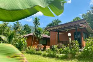Zahrada ubytování Guesthouse 88 Phang Nga + 18 fotografií