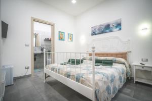 A bed or beds in a room at Il Sogno