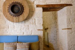 Posezení v ubytování Trulli Soave