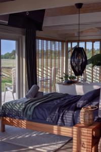 Postel nebo postele na pokoji v ubytování Nordicstay Noarootsi Kastehein or Loojangu villa