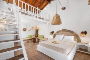 Posteľ alebo postele v izbe v ubytovaní Elefteria Apts & Suites