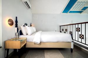 Hotel Sonar Bangla Mayapur客房内的一张或多张床位