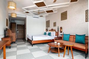 Hotel Sonar Bangla Mayapur客房内的一张或多张床位