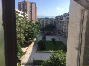 a view from a window of a city street at Art Gallery Apartment in Skopje