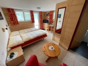 Postel nebo postele na pokoji v ubytování Chalet Kolibri