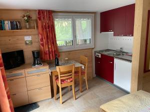 Kuchyň nebo kuchyňský kout v ubytování Chalet Kolibri