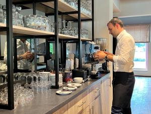 Příslušenství pro přípravu čaje a kávy v ubytování Hotel Da Toni