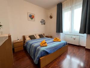 Katil atau katil-katil dalam bilik di Apartment La Casa del Viaggiatore - 4 ppl - 13min to Milan - Free public parking