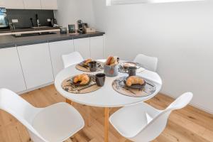 Kuchyň nebo kuchyňský kout v ubytování NEU: Stylische Suite mit Netflix und Workspace