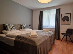 Ένα ή περισσότερα κρεβάτια σε δωμάτιο στο Apartment Via Surpunt - Giacometti - 5 Rooms