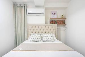 Кровать или кровати в номере Apartamento Central Frente al Mar Cartagena