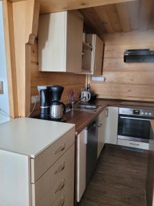 Nhà bếp/bếp nhỏ tại Ferienhaus Gertrud