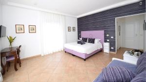 Postel nebo postele na pokoji v ubytování Bella Sorrento B&B