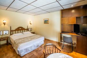 Abba Ordino Babot Hotel客房内的一张或多张床位
