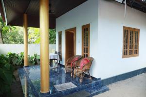 Balkón nebo terasa v ubytování Maràri neena beach homestay