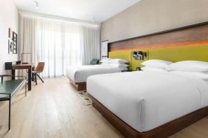 Hyatt Centric Mountain View客房内的一张或多张床位