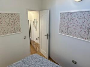 Postel nebo postele na pokoji v ubytování Ático - Dúplex - vista mar