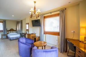 Abba Ordino Babot Hotel客房内的一张或多张床位