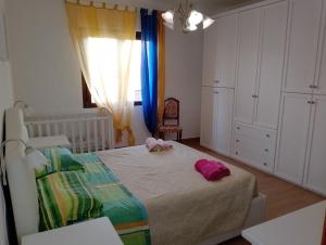 A bed or beds in a room at Casa Albina
