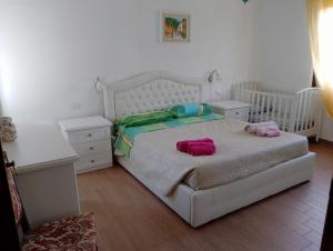 A bed or beds in a room at Casa Albina