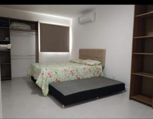 Cama ou camas em um quarto em Golden Lake Arraial do Cabo Resort